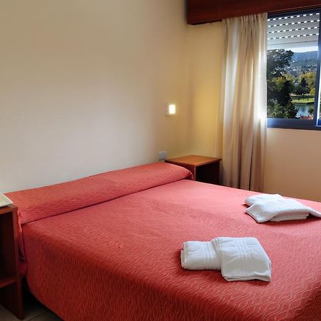 Hotel Temu Вилья-Карлос-Пас Экстерьер фото