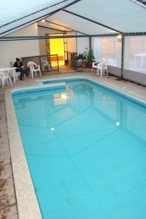 Hotel Temu Вилья-Карлос-Пас Экстерьер фото